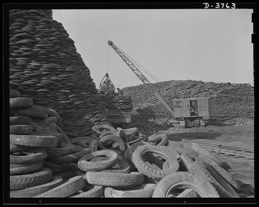 Rubber reclamation. Scrap tires mobilized for Victory. Millions of discarded casings cover more than 100 acres at one Midwest recovery plant. Systematic piling and sectional arrangement reduce fire hazard. Special processes will separate metal from the tires and tube bodies. The reclaimed material w