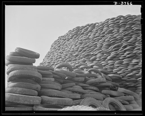 Rubber reclamation. Scrap tires mobilized for Victory. Millions of discarded casings cover more than 100 acres at one Midwest recovery plant. Systematic piling and sectional arrangement reduce fire hazard. Special processes will separate metal from the tires and tube bodies. The reclaimed material w