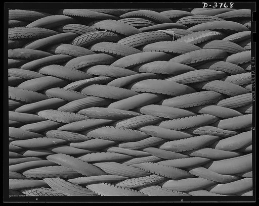 Rubber reclamation. Scrap tires mobilized for Victory. Millions of discarded casings cover more than 100 acres at one Midwest recovery plant. Systematic piling and sectional arrangement reduce fire hazard. Special processes will separate metal from the tires and tube bodies. The reclaimed material w