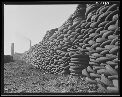 Rubber reclamation. Scrap tires mobilized for Victory. Millions of discarded casings cover more than 100 acres at one Midwest recovery plant. Systematic piling and sectional arrangement reduce fire hazard. Special processes will separate metal from the tires and tube bodies. The reclaimed material w