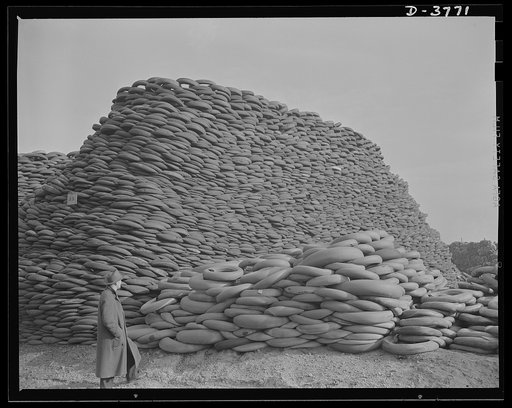 Rubber reclamation. Scrap tires mobilized for Victory. Millions of discarded casings cover more than 100 acres at one Midwest recovery plant. Systematic piling and sectional arrangement reduce fire hazard. Special processes will separate metal from the tires and tube bodies. The reclaimed material w