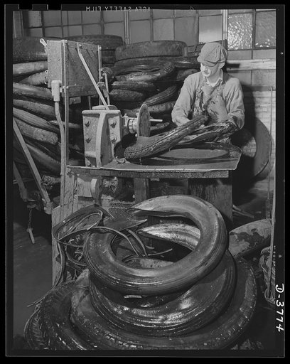 Rubber reclamation. Old rubber goes back to work. An automatic rotary knife removes the wire band portion of a scrap tire. The tire body is then ready to pass through various stages of the xylos reclamation process at a well-known rubber plant. The wire band portion, imcluding a very small amount of