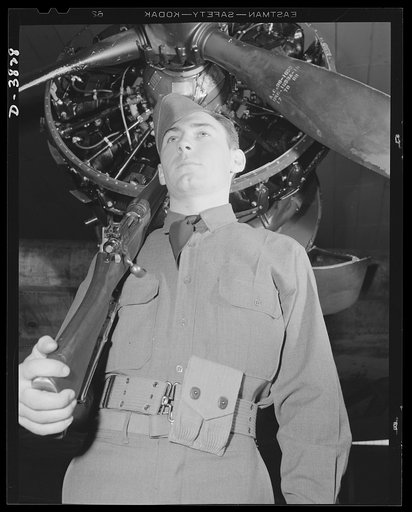 YB-17 bombardment squadron, Langley Field, Virginia. Hanger guard, member of a bombardment squadron stationed at Langley Field, Virginia. His duty is to protect the big YB-17 bombers and other planes while they are in the hangers