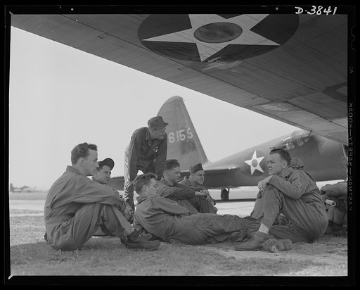 YB-17 bombardment squadron, Langley Field, Virginia. Skilled soldier-mechanics make up the gorund crew personnel of a bombardment squadron stationed at Langley Field, Virginia. These men keep ships like the fast YB-17 bombers in the pink of condition