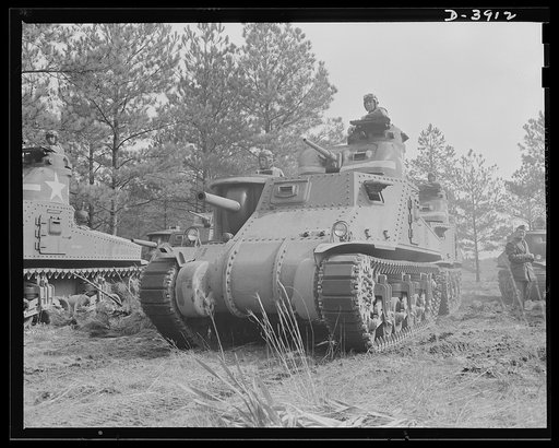 Fort Benning. Tank forces. What the Axis has to face. A medium tank (M-3) and a capable American crew make an effective fighting combination. The training course ar Fort Benning, Georgia is graduating smart and proficient soldiers for the armored forces