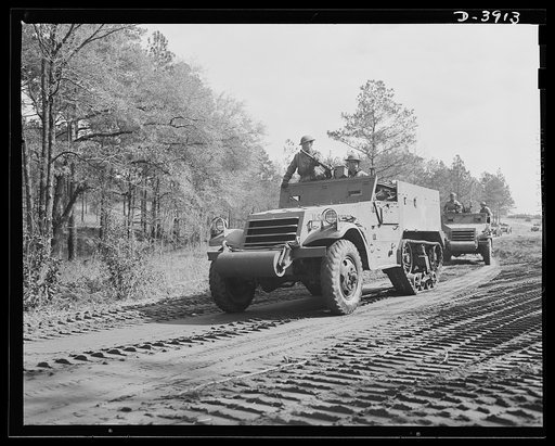 Fort Benning. Halftrac scout cars. America's irresistable might grows every day. Soldiers of the armored forces training in halftrac scout cars at Fort Benning, Georgia are turning rapidly into hard, smart fighting men