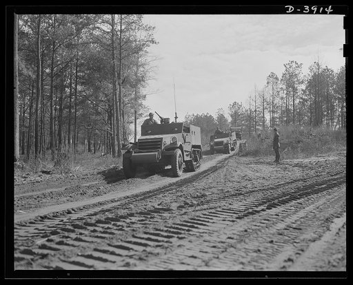 Fort Benning. Halftrac scout cars. America's irresistable might grows every day. Sodiers of the armored forces turning rapidly into hard, smart fighting men
