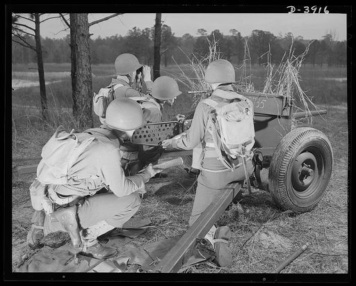 Fort Benning. Anti-tank gun crews. Bad news for Axis tanks. The crew of a 57mm anti-tank gun, one of many in training at Fort Benning, Georgia already handle their piece with the snap and precision of an old timer