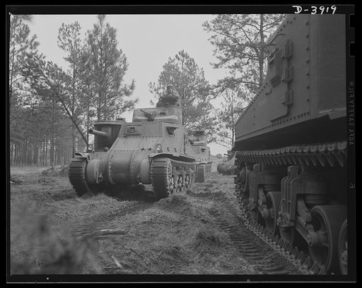 Fort Benning. Tank forces: What the Axis has to face. A medium tank (M-3) and a capable American crew make an effective fighting combination. The training course at Fort Benning, Georgia is graduating smart and proficient soldiers for the armored forces