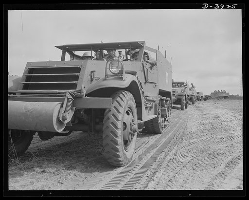 Fort Benning. Halftrac scout cars. America's irresistable might grows every day. Soldiers of the armored forces training in halftrac scout cars at Fort Benning, Georgia are turning rapidly into hard, smart fighting men