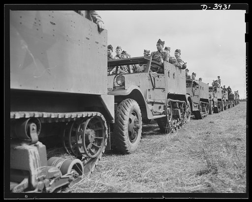 Fort Benning. Halftrac scout cars. America's mechanized army grows mightier every day. Soldiers of the armored forces training in halftrac scout cars at Fort Benning, Georgia are turning rapidly into hard, smart fighting men