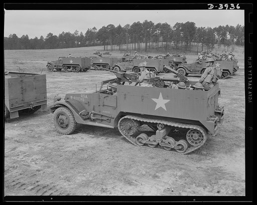 Fort Benning. Halftrac scout cars. America's irresistable might grows every day. Soldiers of the armored forces training in halftrac scout cars at Fort Benning, Georgia are turning rapidly into hard, smart fighting men