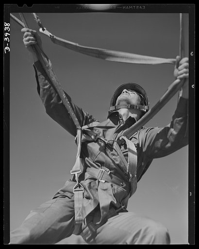 Fort Benning. Parachute troops. The eagle lights on solid ground. One of Uncle Sam's student paratroopers at Fort Benning, Georgia is about to finish a successful descent from a fast moving plane. It took plenty of training and good judgement to do the job right