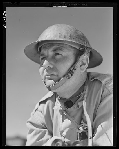 Fort Benning. Armored forces personnel. Lieutenant of the armored forces. One of the men who are "in all the way" to upset the Axis timetable