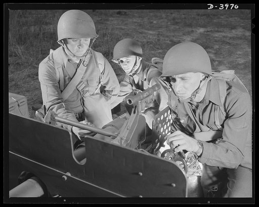 Fort Benning. Anti-tank gun crews. Crew of a 37mm anti-tank gun in training at Fort Benning, Georgia handles their pieces like oldtimers