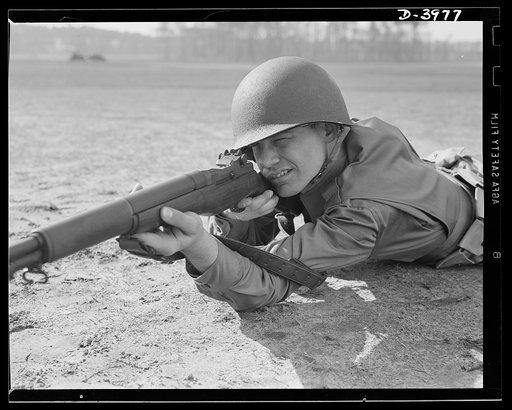 Fort Benning. Rifleman. Garand rifle. When Uncle Sam makes big medicine against his enemies, he puts in strong ingredients. An American infantryman with a Garand rifle to meet the Army's high standards of workmanship