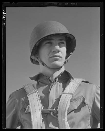 Fort Benning. Parachute troops. Uncle Sam picks a high type of man for a parachute infantryman. This student paratrooper at Fort Benning, Goergia has just completed a descent of which any oldtimer would be proud