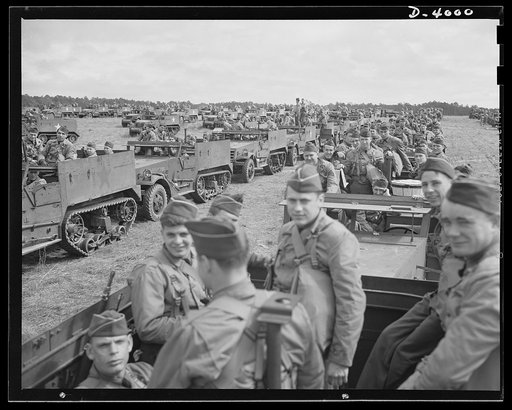 Fort Benning. Halftrac scout cars. America's irresistable might grows every day. Soldiers of the armored forces training in halftrac scout cars at Fort Benning, Georgia are turning rapidly into hard, smart fighting men