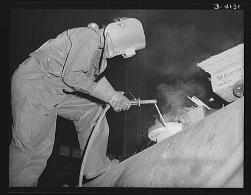Production. Marine boilers. A nozzle is welded on a marine boiler drum in a big Midwest plant producing essential equipment for the Army and Navy