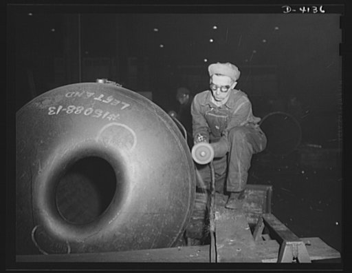 Production. Marine boilers. A seam on a marine boiler is ground in a big Midwest plant producing essential equipment for the Army