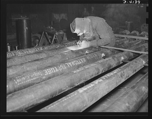 Production. Marine boilers. Spacers in a multi-tube condensor are welded in a large Midwest plant now producing many war essentials