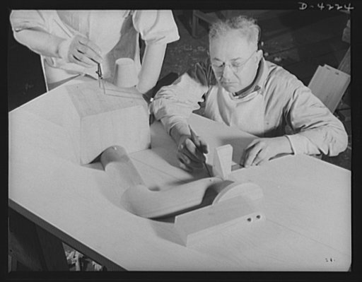 Production. Diesel engines. Skilled pattern makers of a Midwest diesel plant check their work. Good patterns help the war production drive by speeding foundry and machine operations