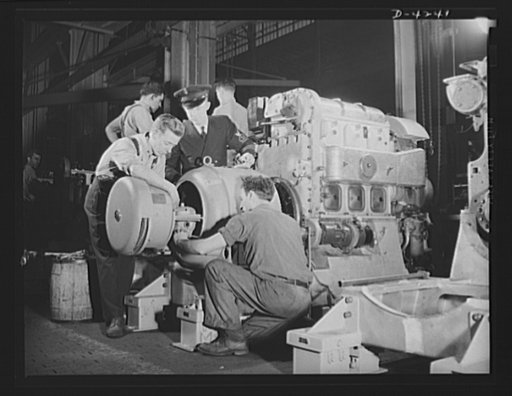 Production. Diesel engines. An electrical generator is coupled to a diesel engine being made for the Navy at a Midwest manufacturing plant