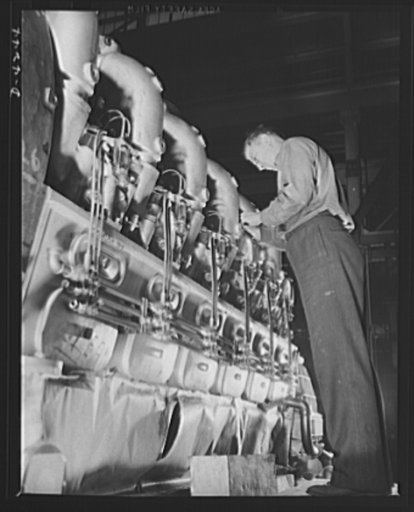 Production. Diesel engines. The valve mechanism of a diesel engine for the Navy is adjusted at a Midwest manufacturing plant