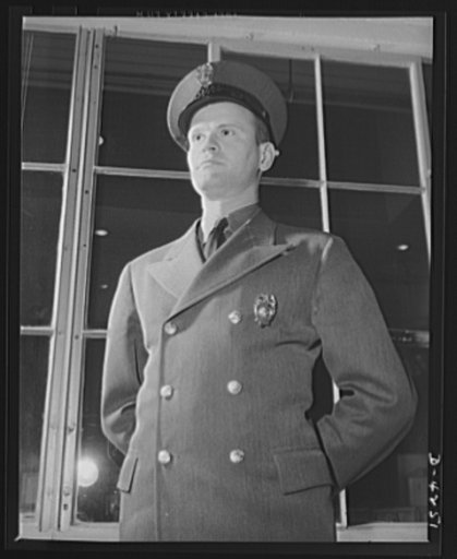 Production. Diesel engines. Plant policeman at a big Midwest manufacturing plant producing diesel engines for the Navy