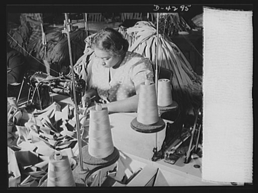 Women workers at quartermaster depot. Clothing for America's expanding army is being made by garment workers throughout the contry. This quartermaster corps depot employee is turning out regulation neckties in mass production quantity. Philadelphia Quartermaster Corps