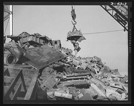 Production. Milling machines and machine castings. In this pile of scrap cast iron there are old machine tool beds, foundry flasks, pipe, boilers, automobile engine blocks -- almost anything that a magnet will pick up. Location: large Midwest machine tool foundry