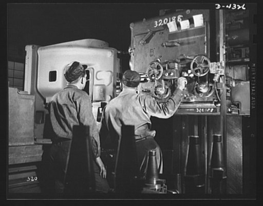 Production. Milling machines and machine castings. Machine tool builders would be helpless without a great number and variety of machine tools for their own work. A special horizontal milling machine is here performing an operation on the column of what will become a knee and column type milling mac