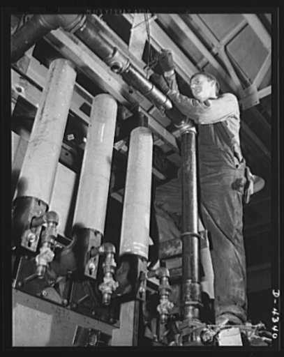 Production. Milling machines and machine castings. A new heat-treating furnace being installed in one of the country's leading machine tool plants. Heat-treating is one of the most important steps in the manufacture of sturdy, accurate moving metal parts, because a given piece of metal can be made e
