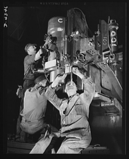 Production. Milling machines and machine castings. Many minds, many heads, many skills went into the construction of this large, hydraulically-operated milling machine. The slender shaft just below the figure "100" in the upper right is a tracer finger, so called because it feels its way gently arou