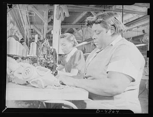 Manpower. Negro aircraft workers. Workers of various races contribute their skills to war industry. To safeguard American cities against all contingencies, these workers in an Eastern arsenal are sewing hand harness tabs on gas masks, which are being turned out in mass production volume. Edgewood Ar