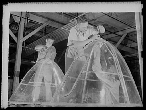 Manpower. Negro bomber plant workers. American manpower draws its skills from various racial groups alike. Here, in a large Eastern bomber plant, huge transparent plastic bomber noses are being conditioned for installation on planes which will carry America's offensive to the far conrers of the worl