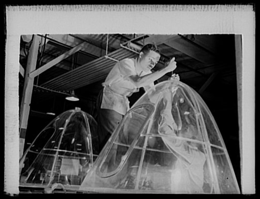 Manpower. Negro bomber plant workers. American manpower draws its skills from various racial groups alike. Here, in a large Eastern bomber plant, huge transparent plastic bomber noses are being conditioned for installation on planes which will carry America's offensive to the far corners of the worl