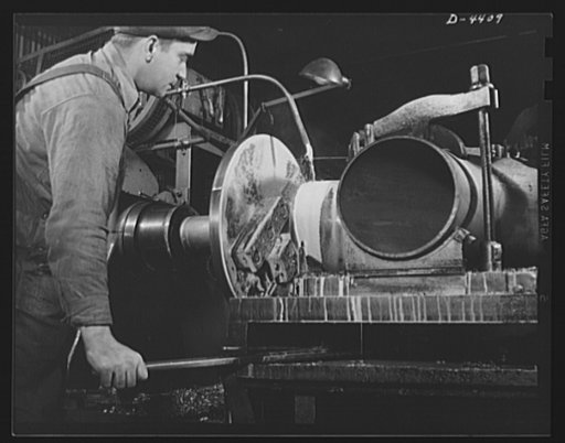 Production. Pipe fittings. Beveling a large pipe elbow to prepare it for butt welding. Elbows like this, for use in Army equipment, are made by bending straight pipe in a large Midwest plant. Tube Turn Incorporated