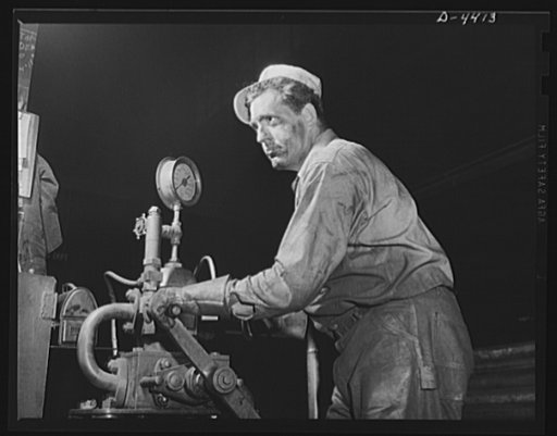 Production. Pipe welding. Giving the production drive his personal attention. This husky machine operator in a large Midwest machine shop is a type of manpower that is helping to show America's might against the Axis. Tube Turn Incorporated