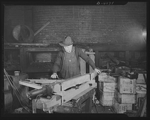 Production. Wagon wheels. Revival of a dying art. Assembling wagon running gear in a Southern wagon plant which is receiving a rush of orders these days as a result of the rubber shortage