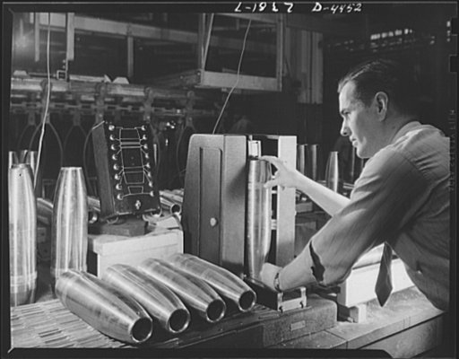Conversion. Auto parts to artillery shells. Finished artillery shells are carefully gauged to ensure perfectly uniform ammunition for our fighting men. A converted Midwest auto plant is now producing these shells as efficiently as it turned out parts for automobiles