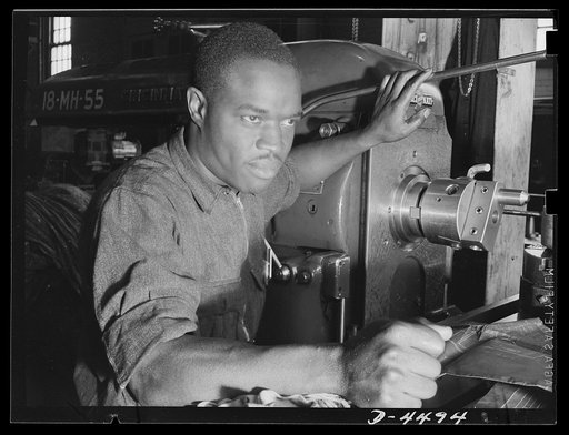 Manpower. Negro navy yard workers. America draws its manpower from all citizens alike. A product of the government's extensive training program for American youth, this Negro machinist daily performs important operations in the ship-building program of a large navy yard on the East Coast