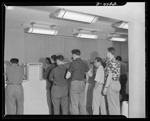 Car pooling at Lockheed Vega. And so Don goes to the transportation office to see what can be done. The hope of many employees is to be certified to the rationing board as deserving of new tires or retreads, but if the employee is convenient to existing transportation or company bus line or lives wi