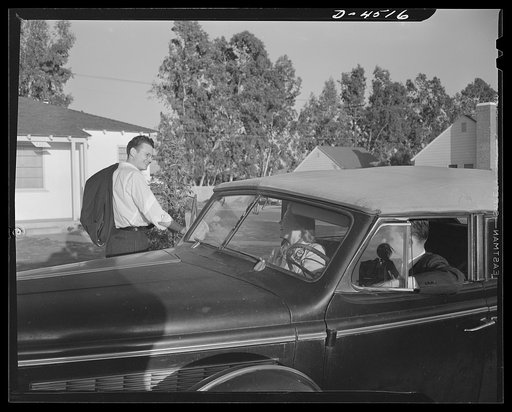 Car pooling at Lockheed Vega. Next stop is Don's house, one of a long row of new privately-financed housing projects in a critical housing area
