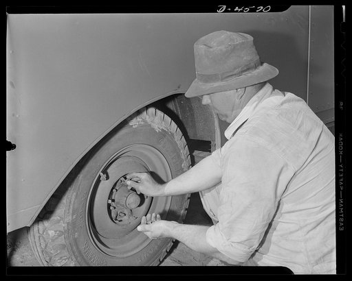 War housing. Lompoc trailer camp. Tires of a war housing trailer are removed as soon as this home for a war worker's family is delivered. The Western Trailer Company of Los Angeles uses these tires for further deliveries. The branded tires may be seen at the top