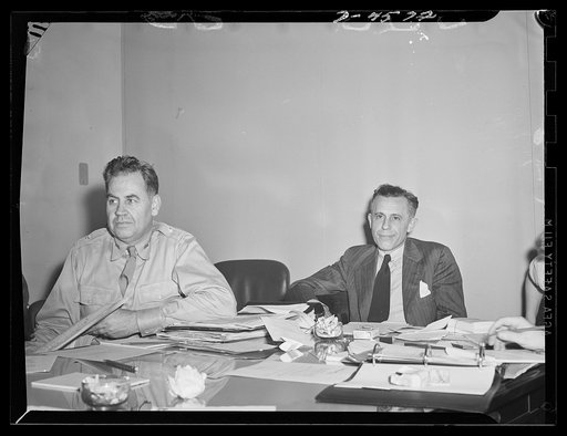 First meeting of labor-management policy committee of the War Manpower Commission (WMC). Brigadier General Frank J. McSherry, director of operations at WMC and Fowler Harper, deputy chairman of the WMC