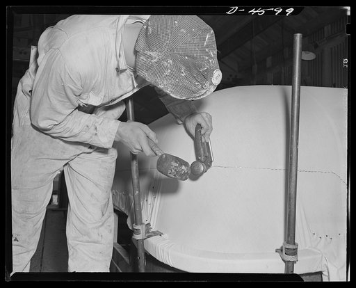 Production. War housing trailers. Many time-saving methods are employed in the making of war housing trailers at the Los Angeles plant of Western Trailer Company. A heavy-duty stapling machine, for example, makes fast work of fastening the waterproof finish sheeting in place. Later a decorative stri
