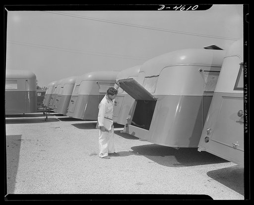 Production. War housing trailers. The inside and outside of each war housing trailer is thoroughly checked before receiving okay for delivery from the Los Angeles plant of Western Trailer Company. These rolling homes currently sell for about twelve hundred five dollars, f.o.b. Los Angeles