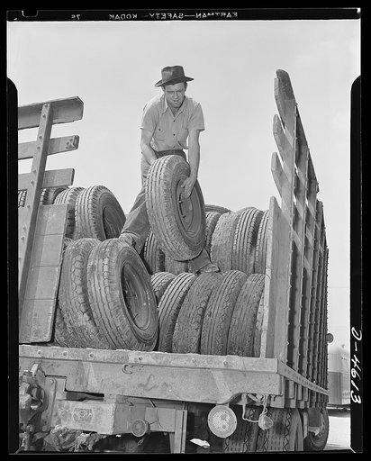 Production. War housing trailers. Multiple duty for war housing trailer tires. Back from a trailer housing site comes this Department of Agriculture truck with 150 tires on which new war housing trailers were delivered from the Los Angeles plant of Western Trailer Company. Upon delivery, trailers ar