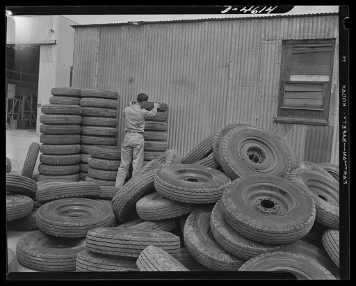 Production. War housing trailers. Tires for war housing trailers do multiple duty. These 150 prize "shoes" have been returned from war housing areas after removal from trailers delivered from the Los Angeles plant of Western Trailer Company. They will be used in further deliveries of new trailers. E